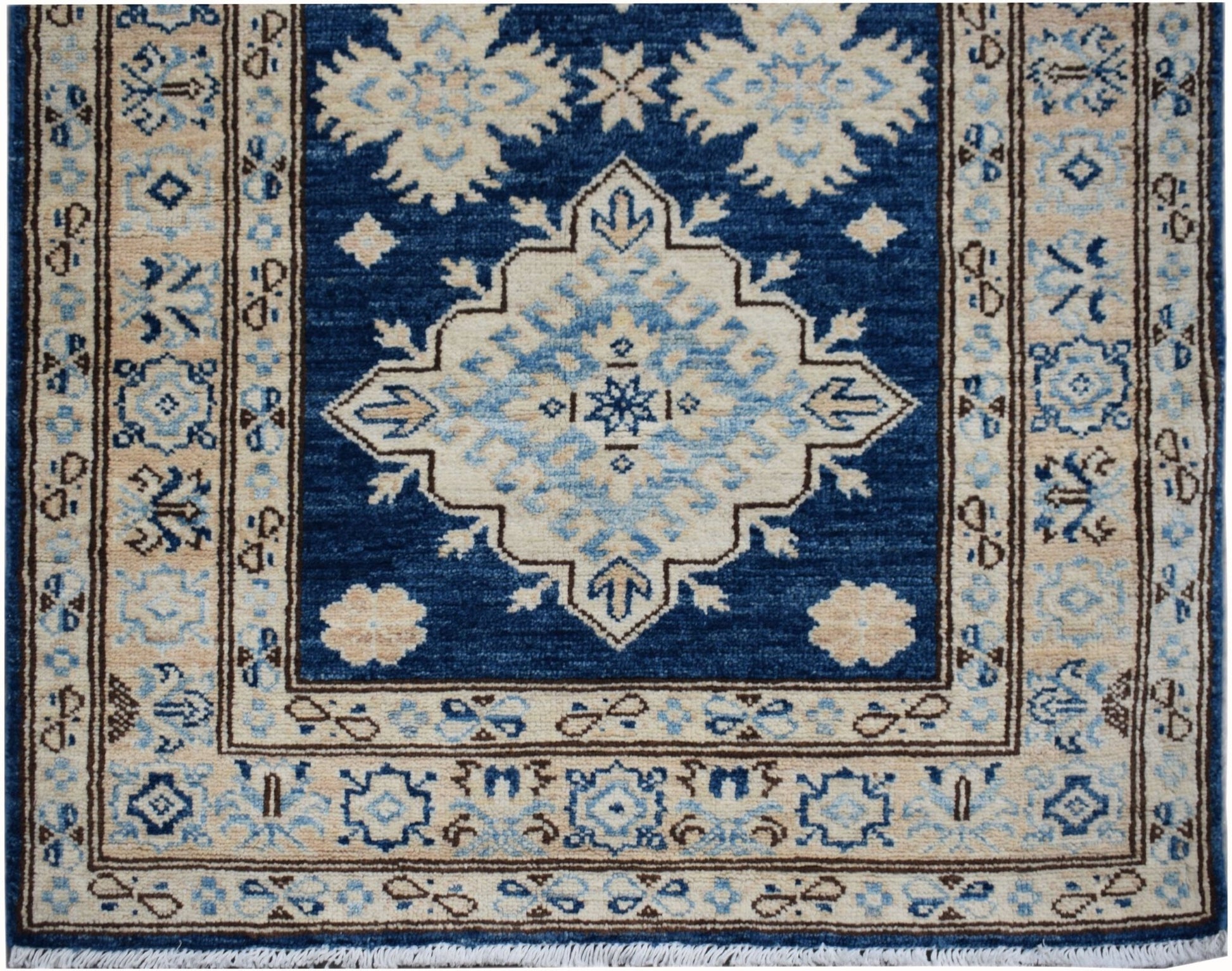 Handmade Afghan Super Kazakh runner rug featuring a central medallion in blue and beige wool.
