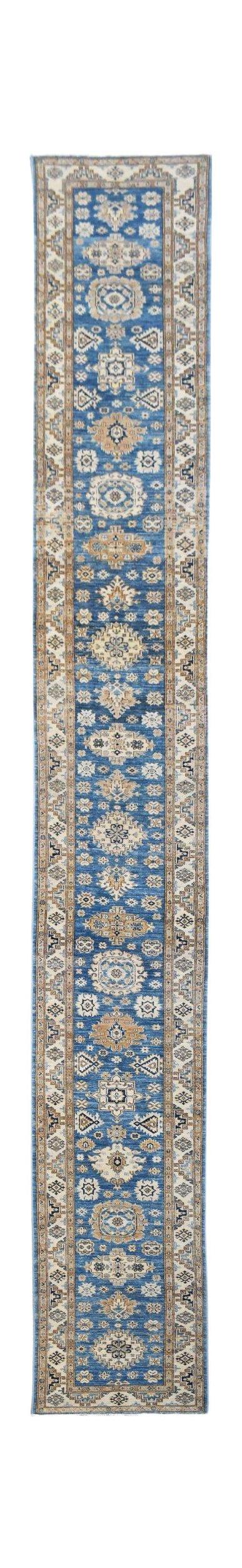 A handmade Afghan Super Kazakh runner rug featuring traditional blue and beige geometric patterns.