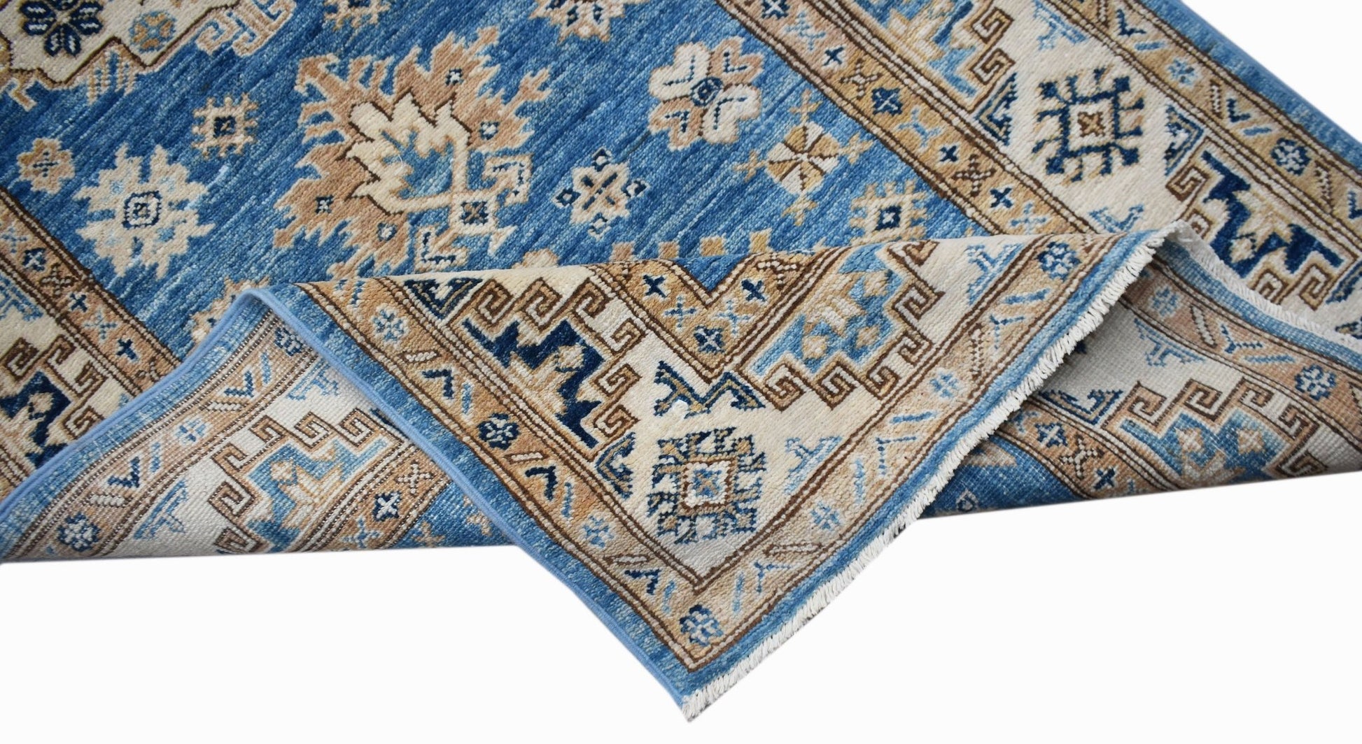 A handmade Afghan Super Kazakh runner rug featuring traditional blue and beige geometric patterns.