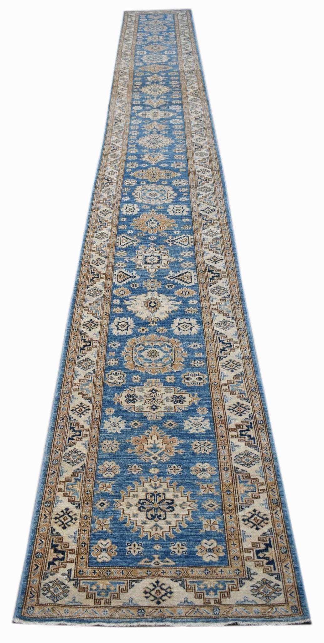 A long, handmade Afghan Super Kazakh runner rug featuring traditional geometric motifs in blue.