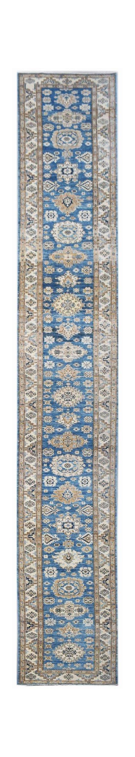 A long, handmade Afghan Super Kazakh runner rug featuring traditional blue, beige, and cream motifs.