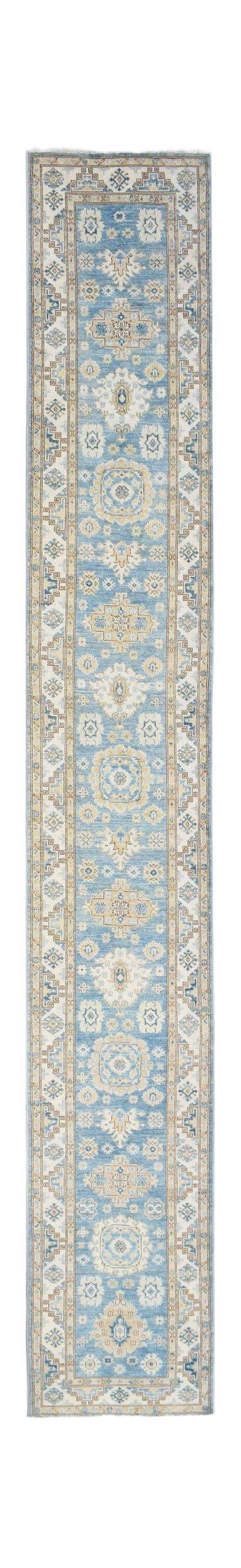 A long, handmade Afghan Super Kazakh runner rug featuring traditional blue and cream geometric motifs.