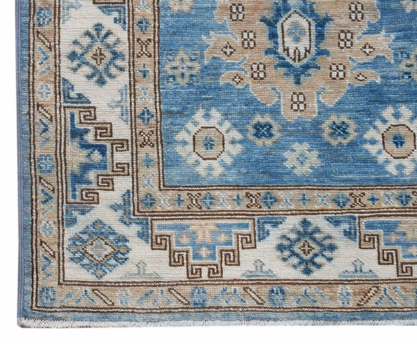 A handmade Afghan Super Kazakh runner featuring traditional blue and beige geometric patterns.