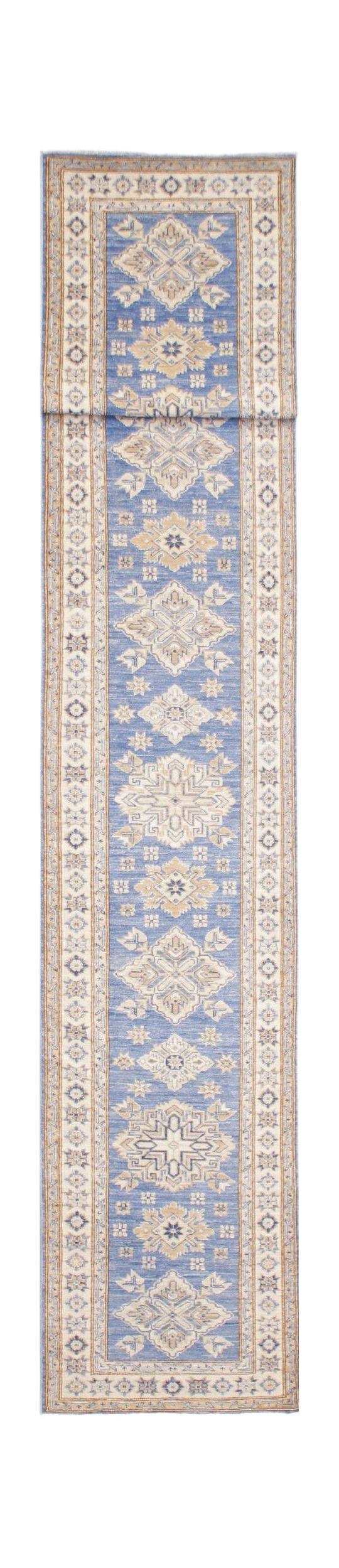 A long, handmade Afghan Super Kazakh runner rug featuring traditional geometric motifs in blue.