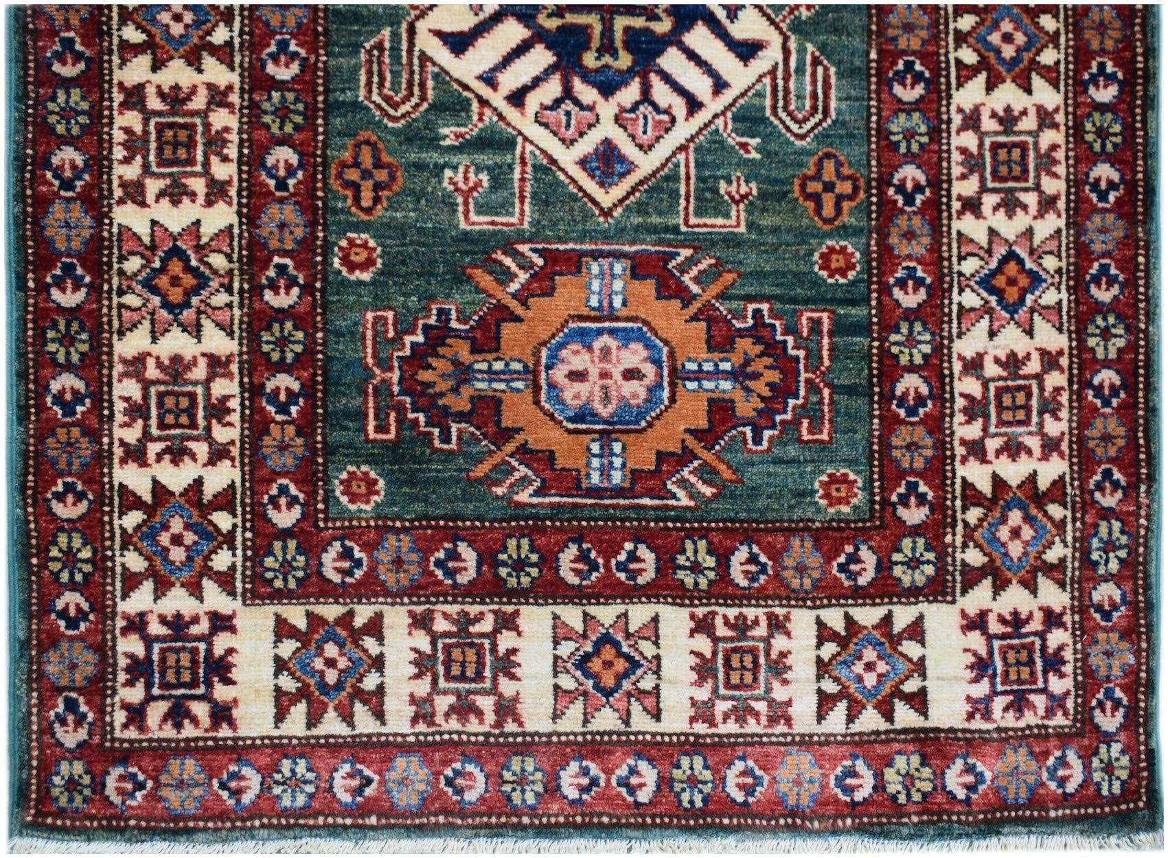 Handmade Afghan Super Kazakh runner rug featuring traditional geometric motifs in red and teal.