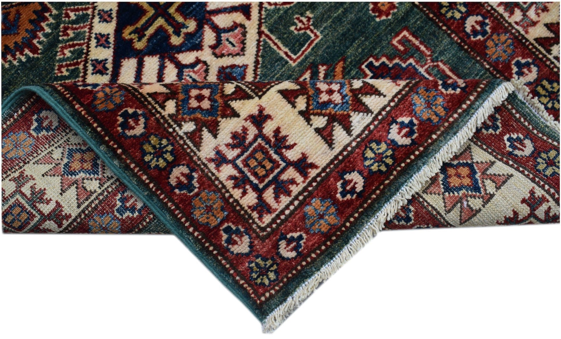 A folded Afghan Super Kazakh runner featuring traditional geometric motifs in red, blue, and cream.