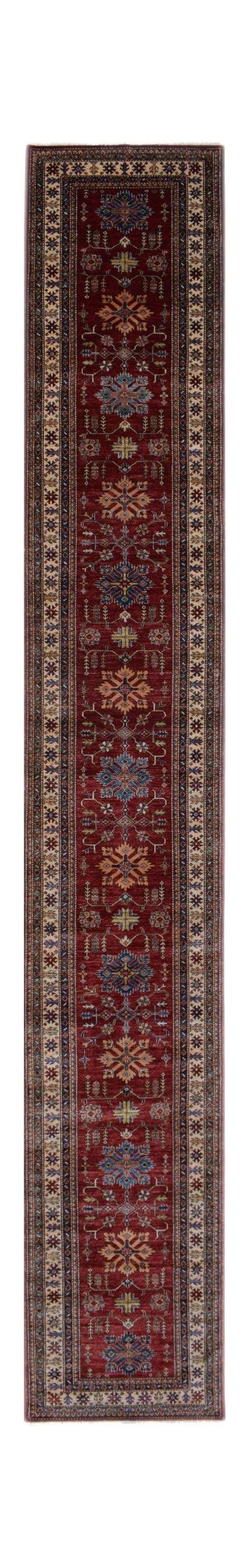A long, handmade Afghan Super Kazakh runner rug featuring traditional geometric motifs in red.