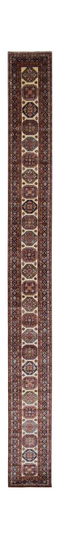 A long, handmade Afghan Super Kazakh runner featuring repeating geometric medallions in wool.