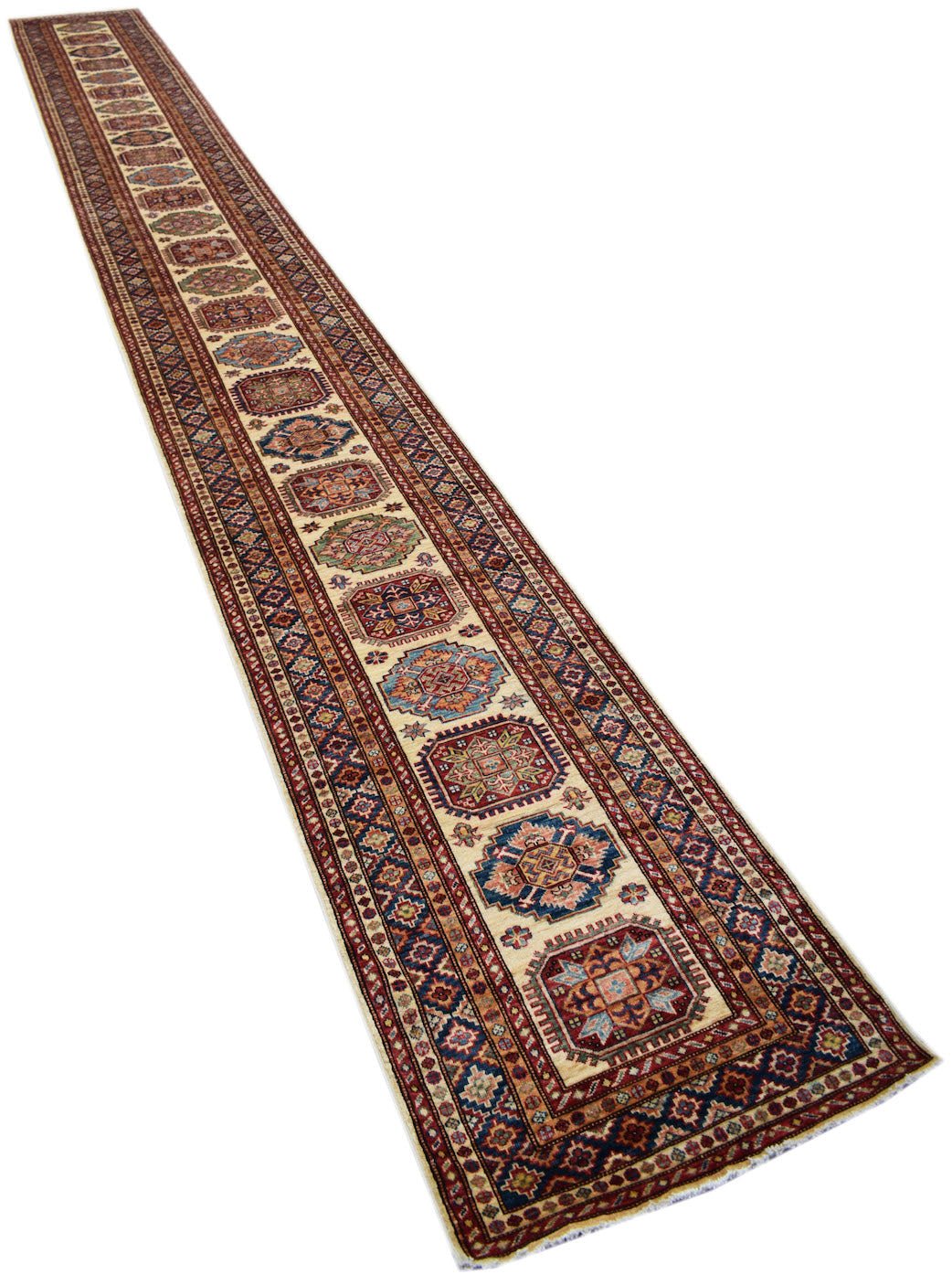 A long, handmade Afghan Super Kazakh runner rug featuring traditional geometric motifs.