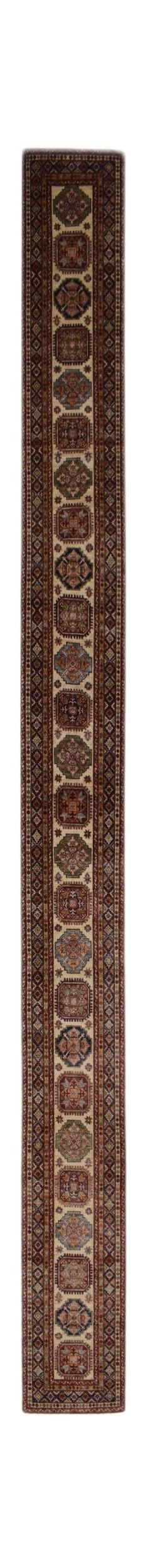 A long, handmade Afghan Super Kazakh runner featuring repeating geometric medallions in warm tones.