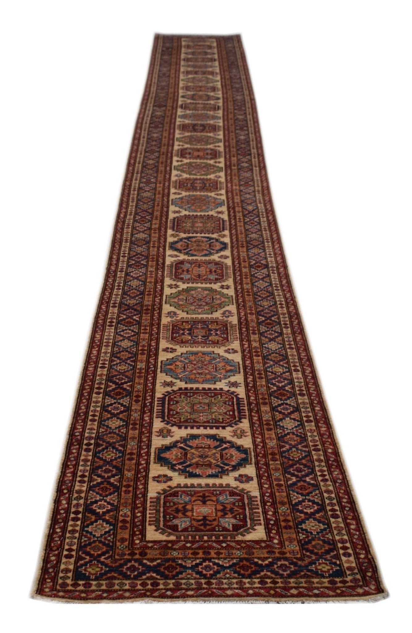 A long, handmade Afghan Super Kazakh runner rug featuring traditional geometric motifs.