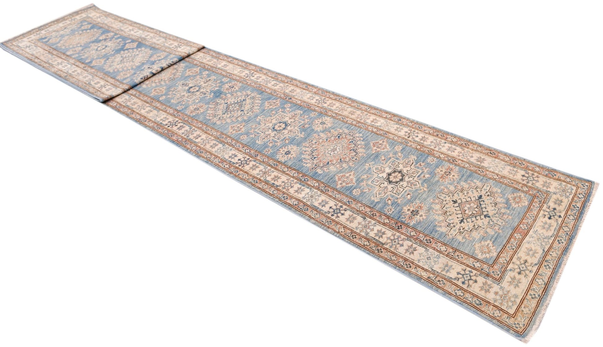 A long, handmade Afghan Super Kazakh runner rug featuring traditional blue and beige geometric motifs.