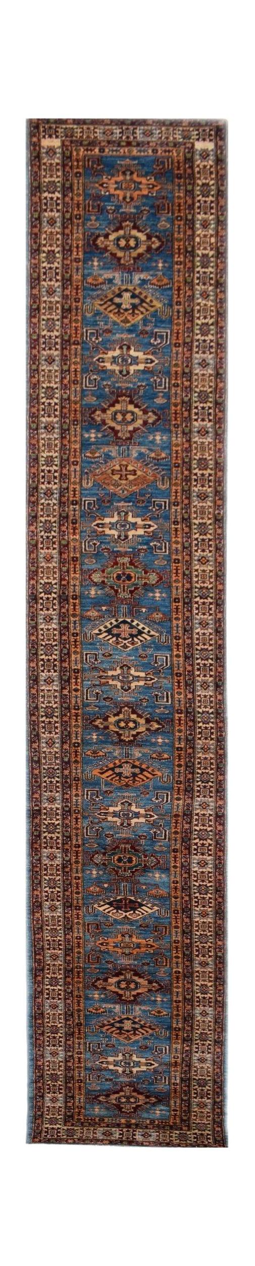 A long, handmade Afghan Super Kazakh runner rug featuring traditional geometric motifs in blue.