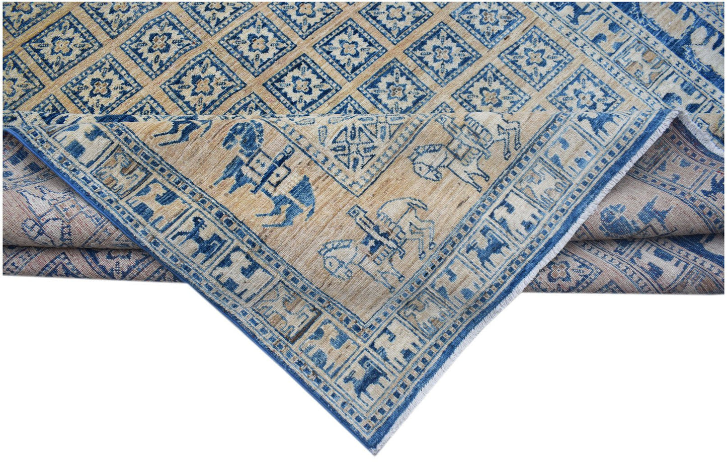 A handmade Afghan Chobi rug featuring a blue and beige geometric pattern with equestrian motifs.
