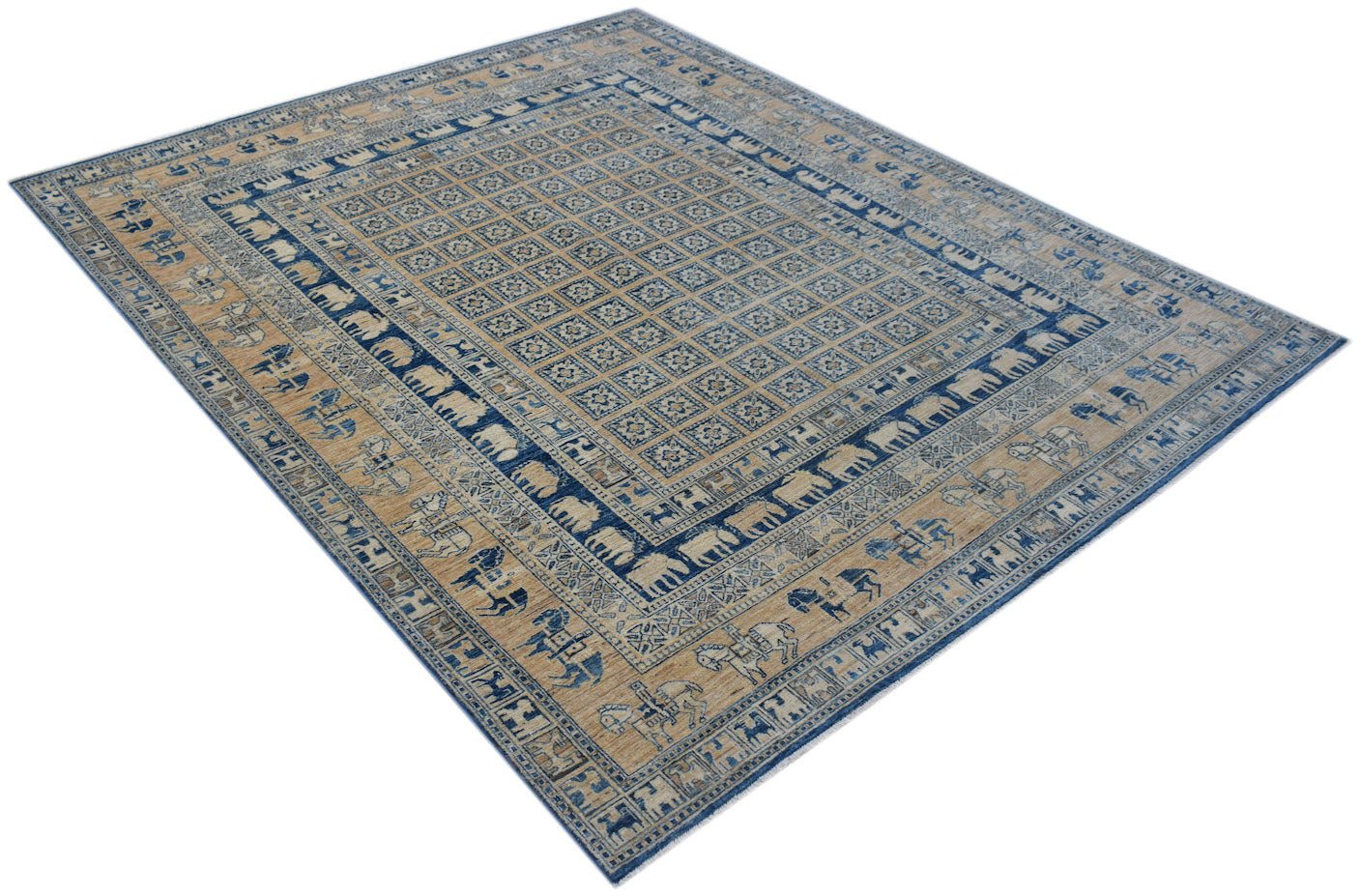 A handmade Afghan Chobi rug featuring a grid pattern and animal motifs in blue and tan tones.
