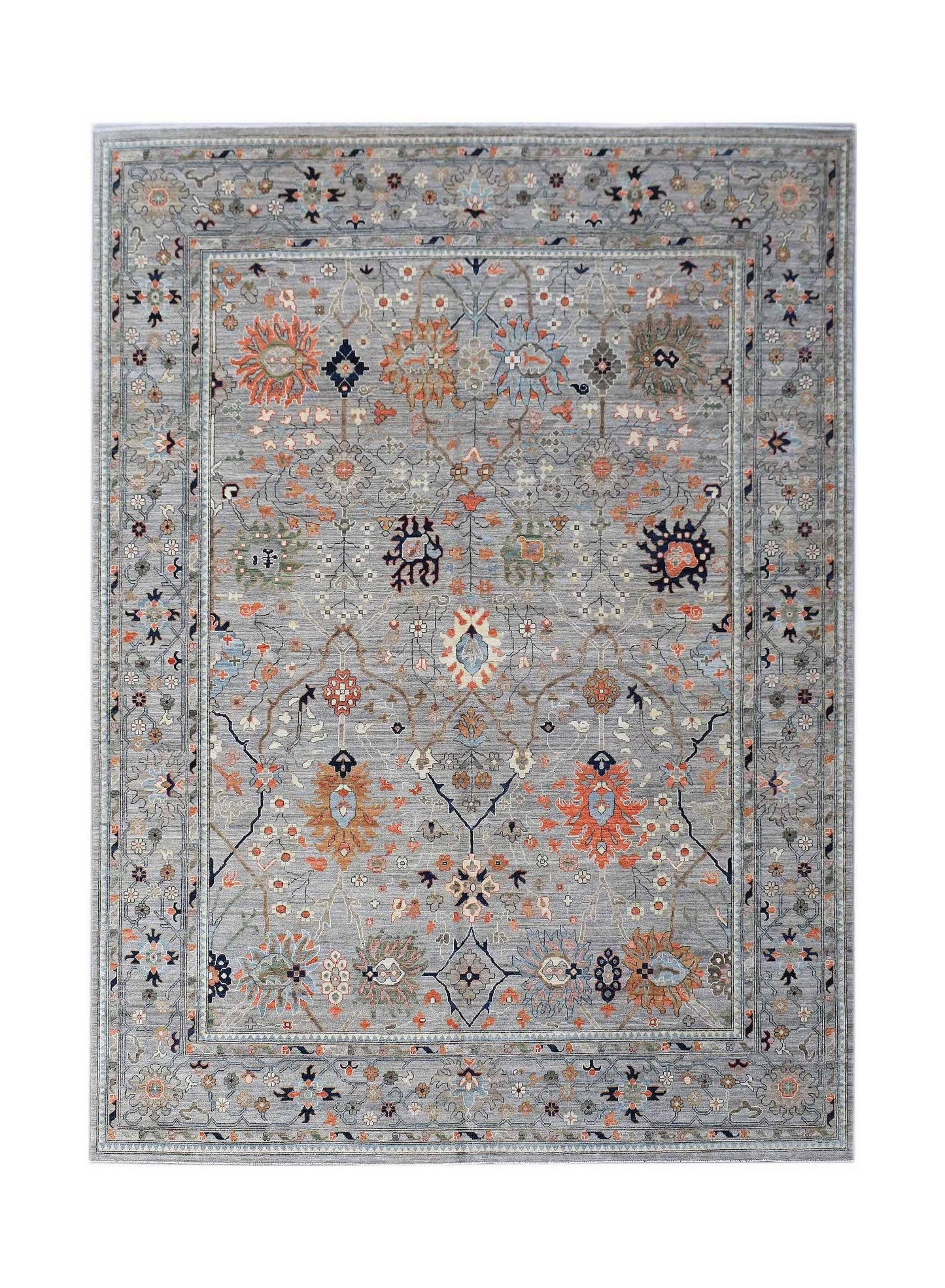 A handwoven Afghan Chobi rug featuring a traditional floral pattern in muted tones on a grey field.