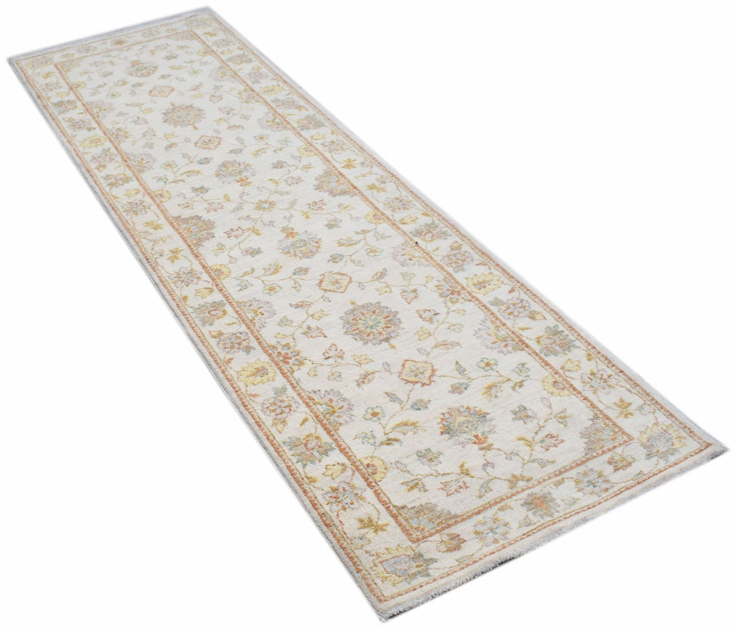 An Afghan Chobi runner rug featuring a traditional floral pattern in soft, muted earth tones.
