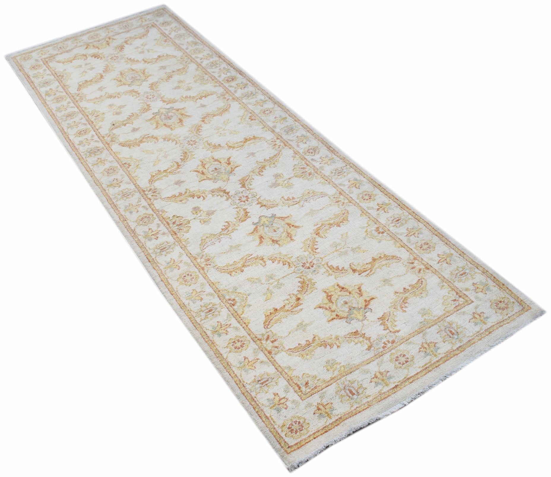 A handmade Afghan Chobi runner rug featuring traditional floral patterns in soft earthy tones.