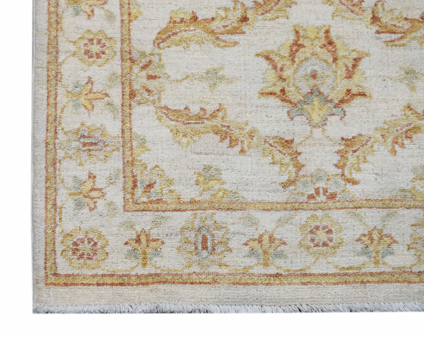 A handmade Afghan Chobi runner featuring a traditional floral pattern in soft earth tones.