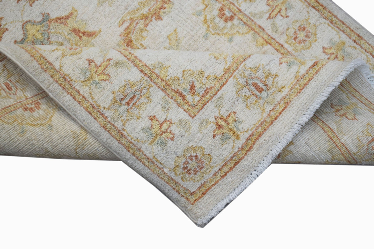 A handwoven Afghan Chobi runner featuring traditional floral patterns in soft earth tones.