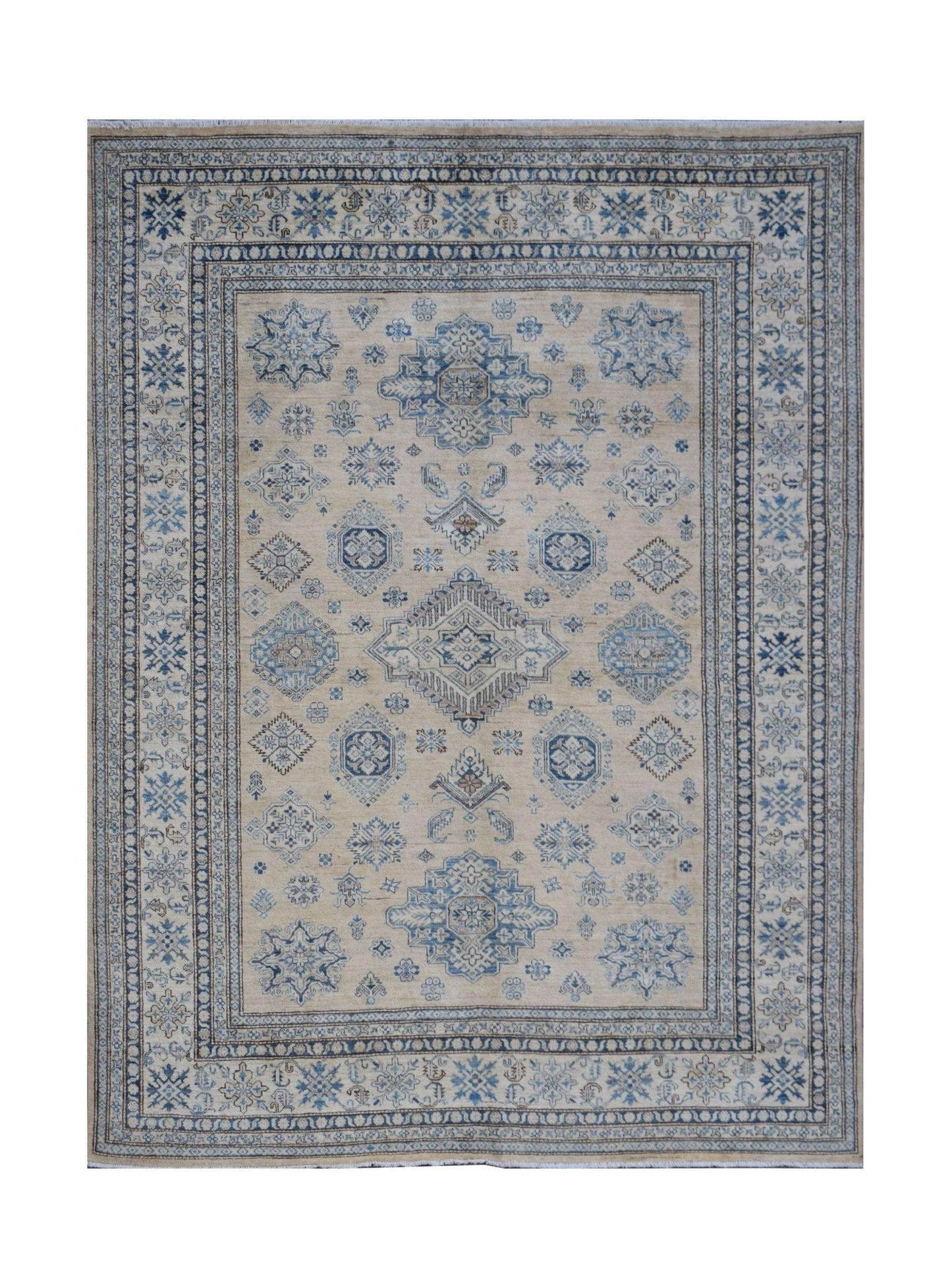 Handmade Afghan Super Kazakh rug featuring traditional blue geometric motifs on a beige background.