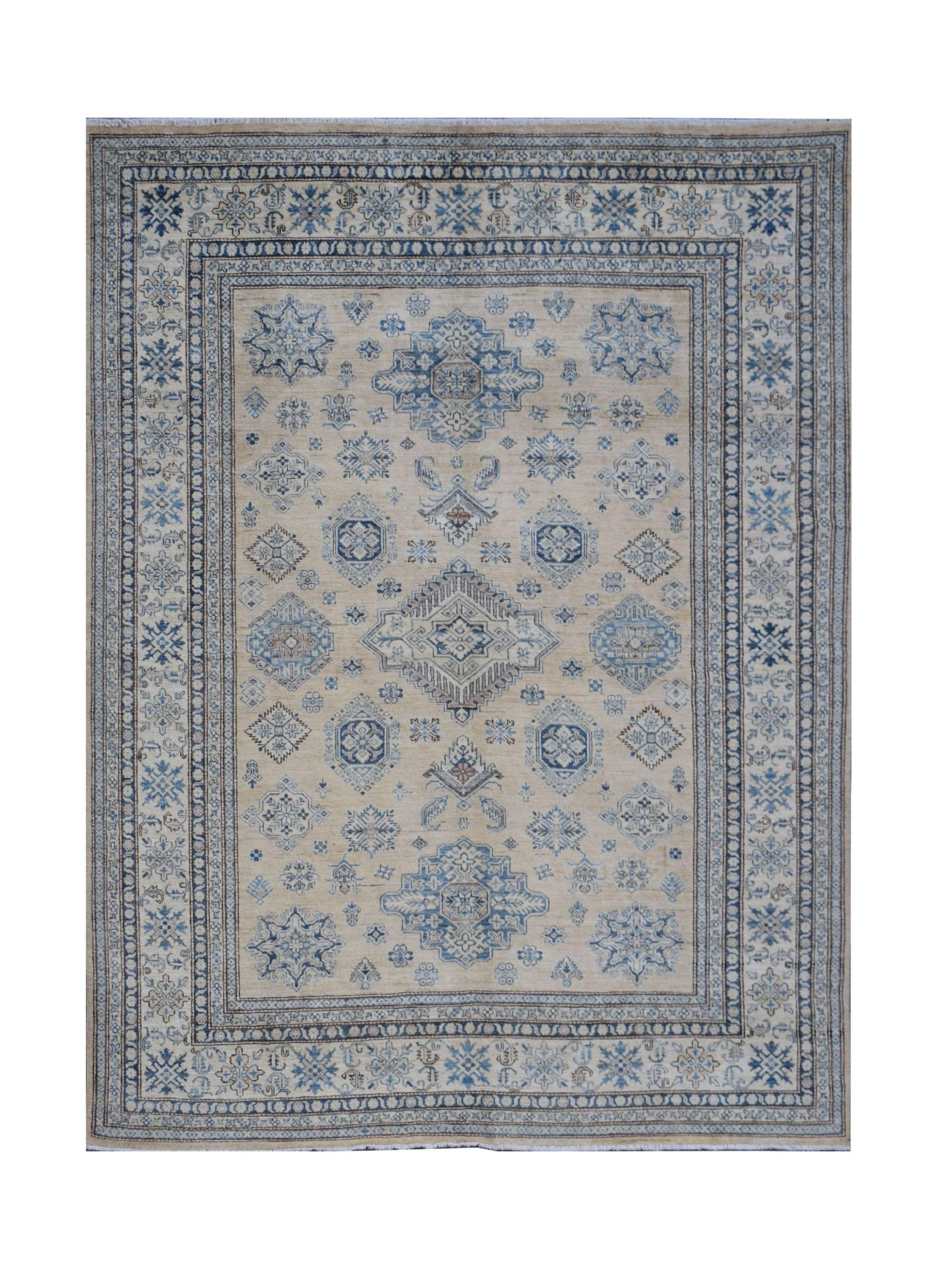 Handmade Afghan Super Kazakh rug featuring traditional blue geometric motifs on a beige background.