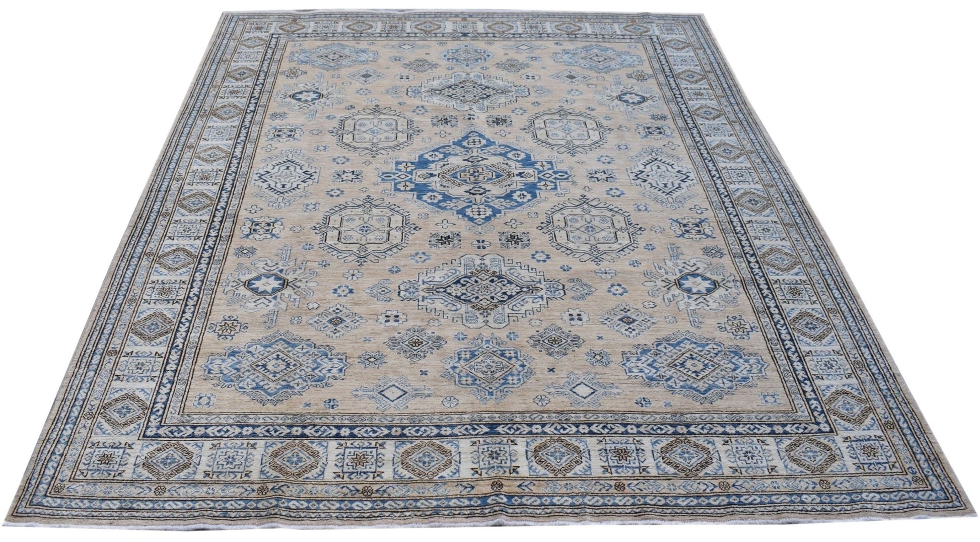 A handmade Afghan Super Kazakh rug featuring traditional blue and beige geometric patterns.