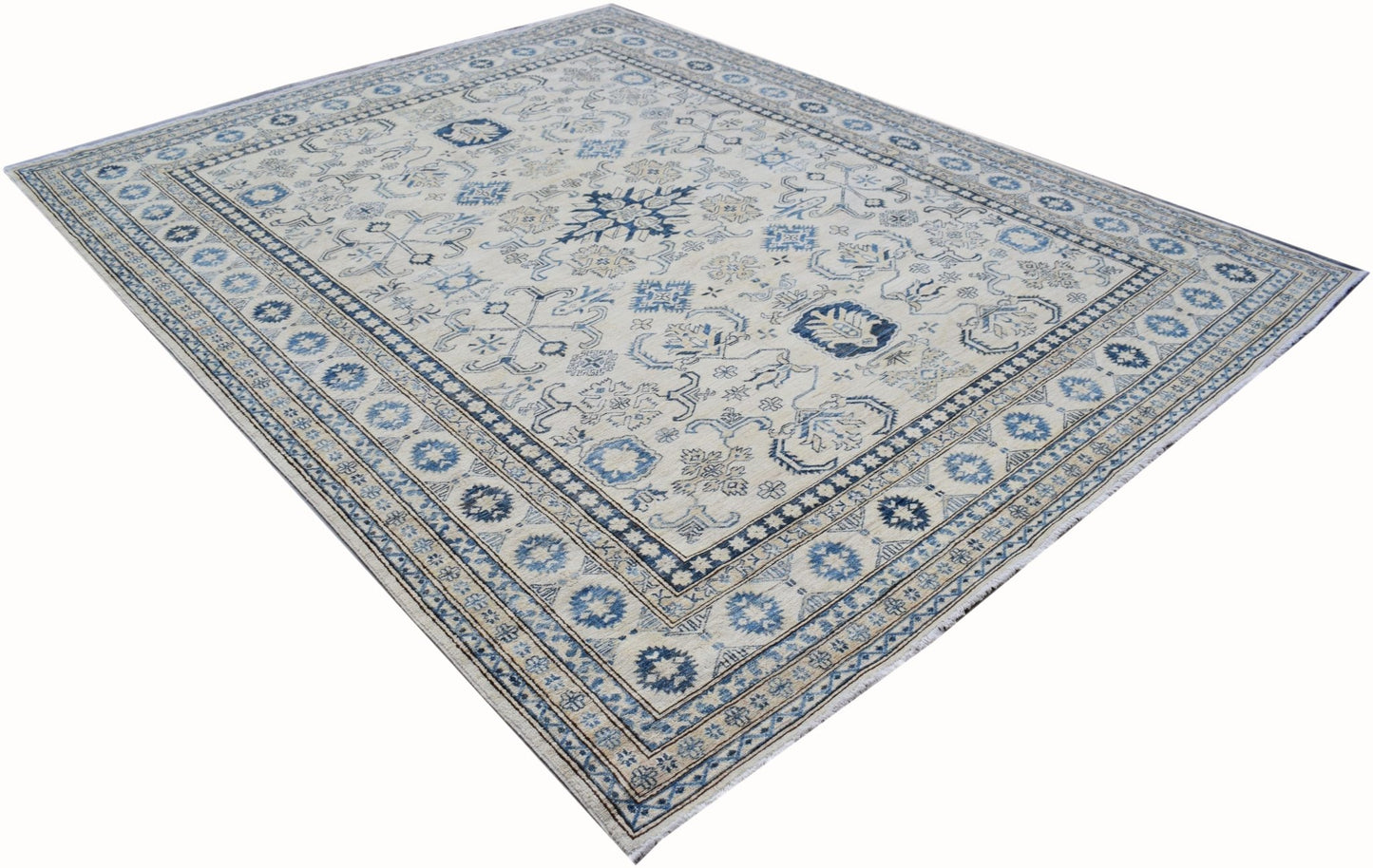 An Afghan Super Kazakh rug featuring traditional blue and cream geometric patterns.