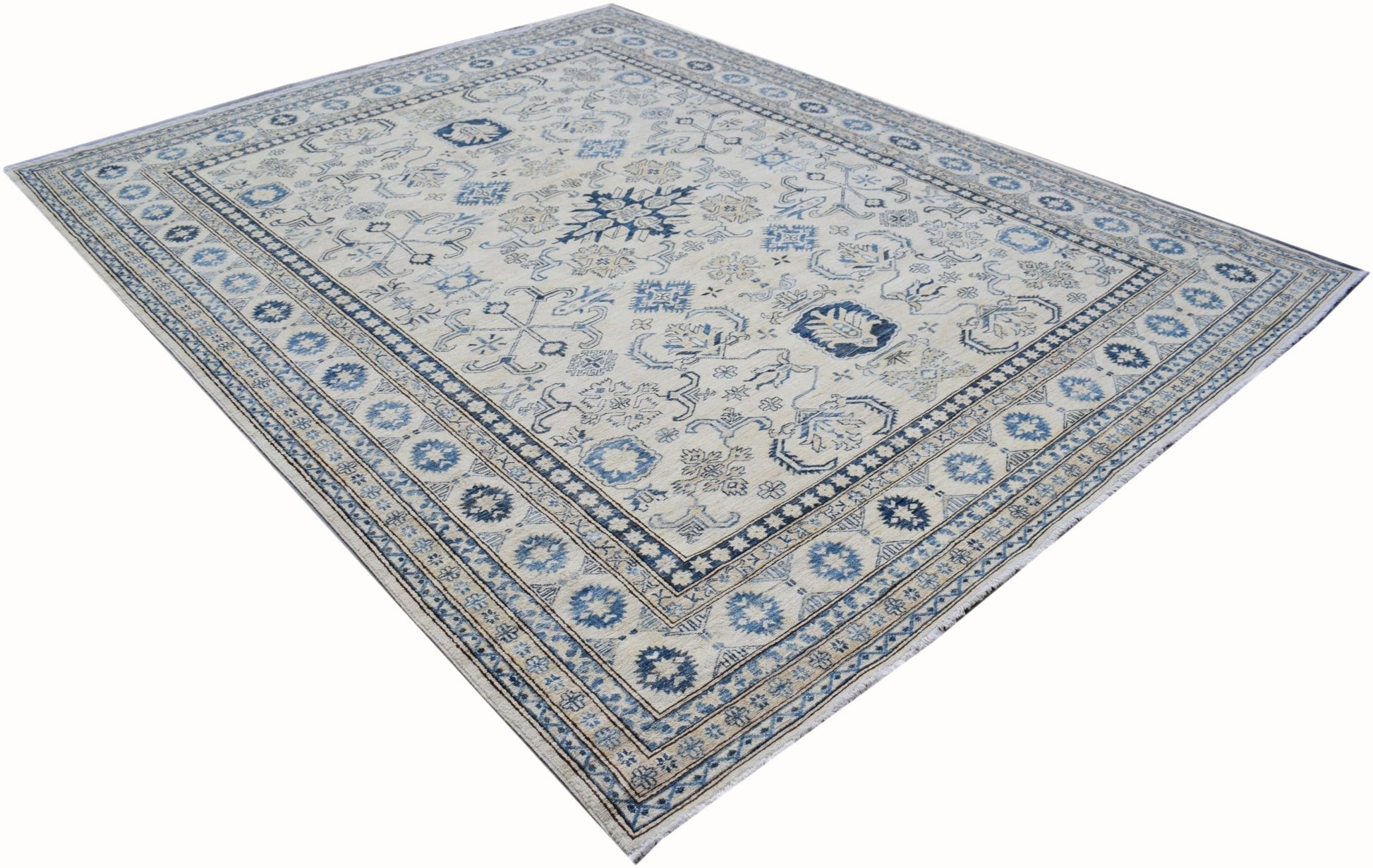 An Afghan Super Kazakh rug featuring traditional blue and cream geometric patterns.