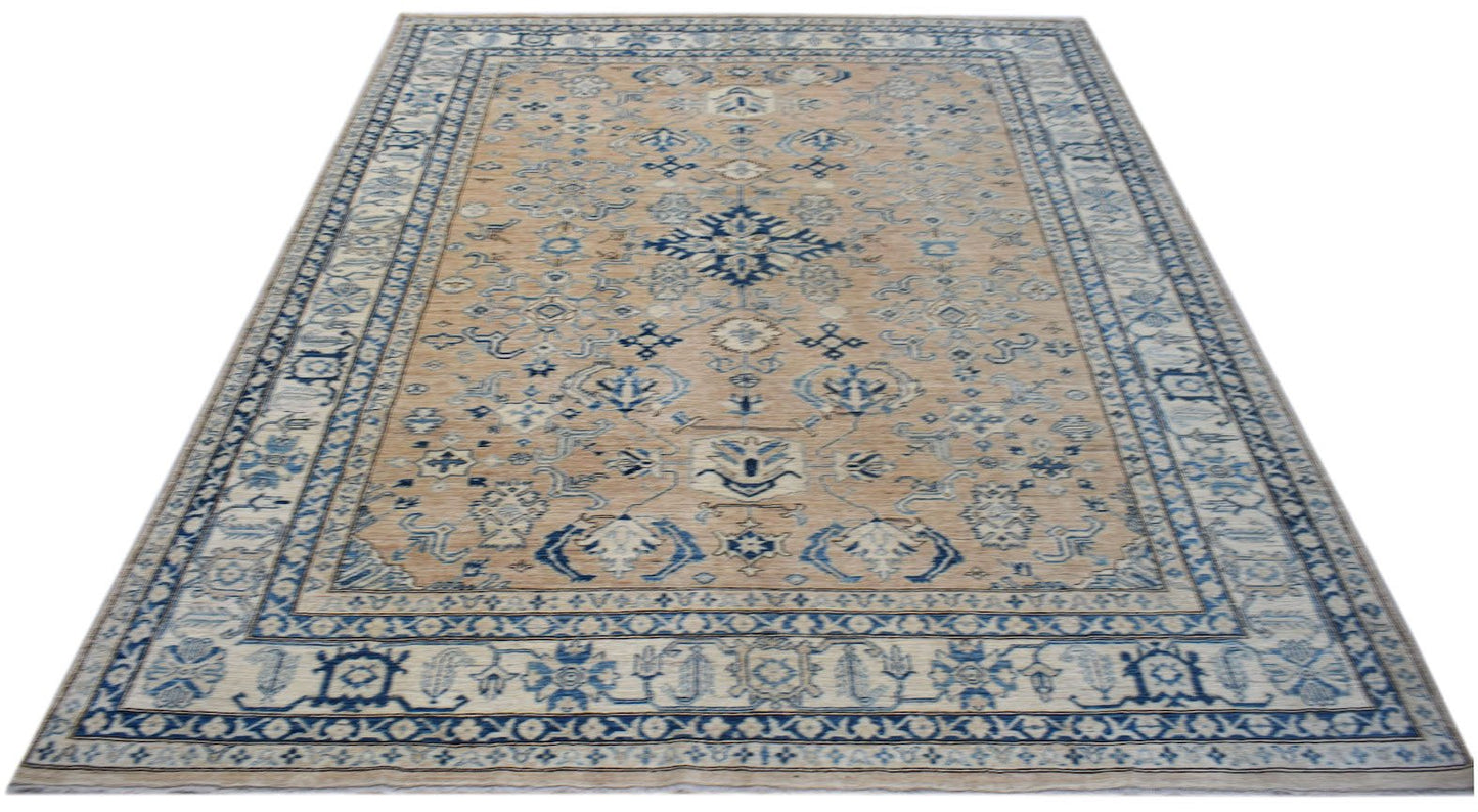 Handmade Afghan Super Kazakh rug featuring traditional blue geometric motifs on a tan wool field.