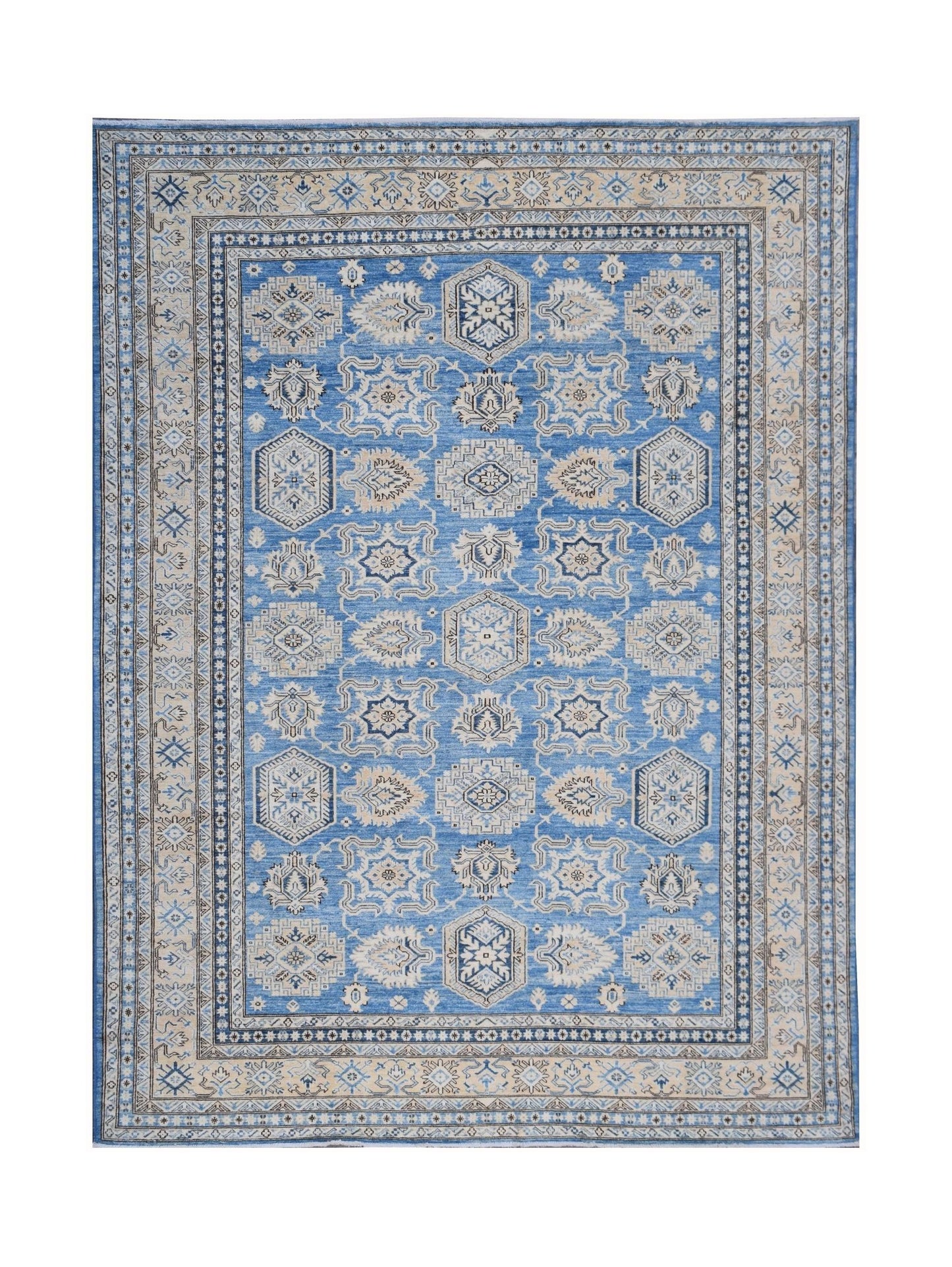 A handmade Afghan Super Kazakh rug featuring traditional geometric motifs in blue and beige.