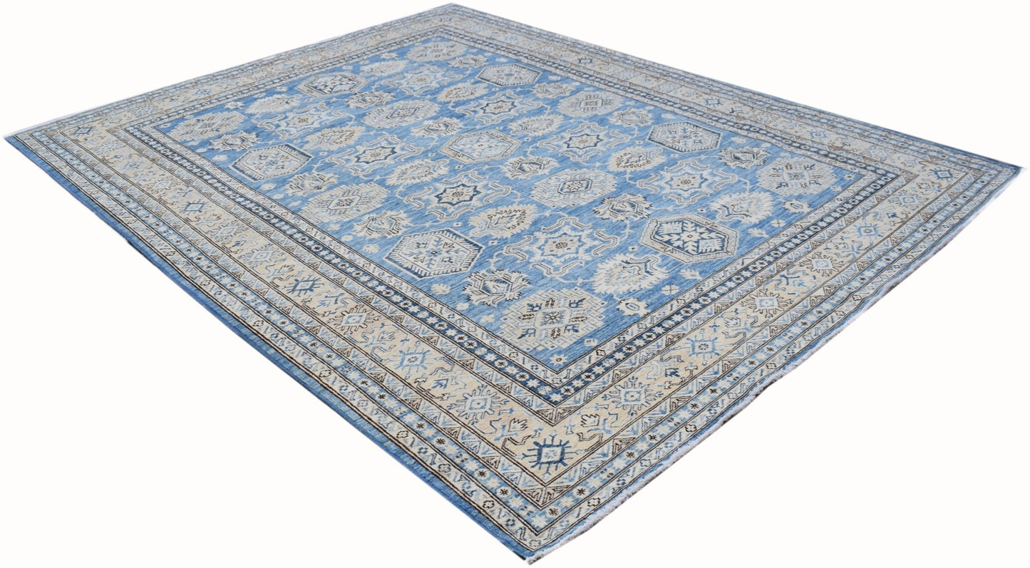 A handmade Afghan Super Kazakh rug featuring traditional geometric motifs in blue and cream tones.