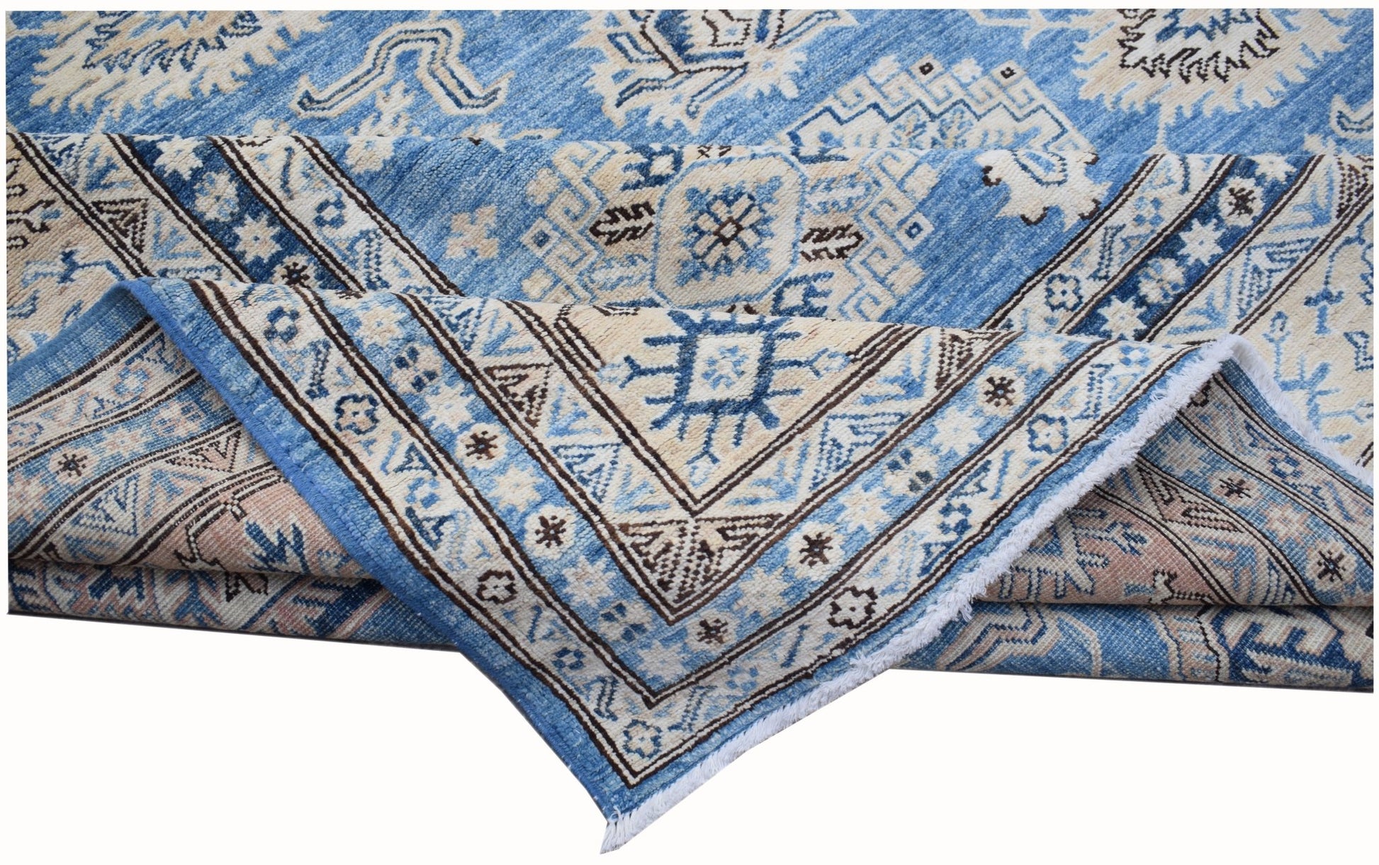A handmade Afghan Super Kazakh rug featuring traditional geometric motifs in shades of blue and cream.