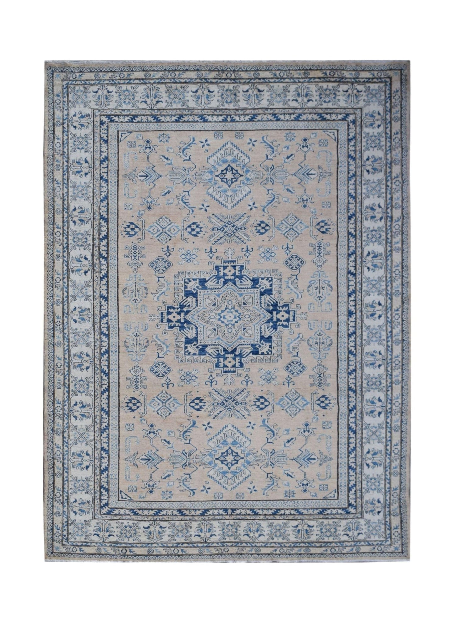 A handmade Afghan Super Kazakh rug featuring traditional blue geometric motifs on a beige field.