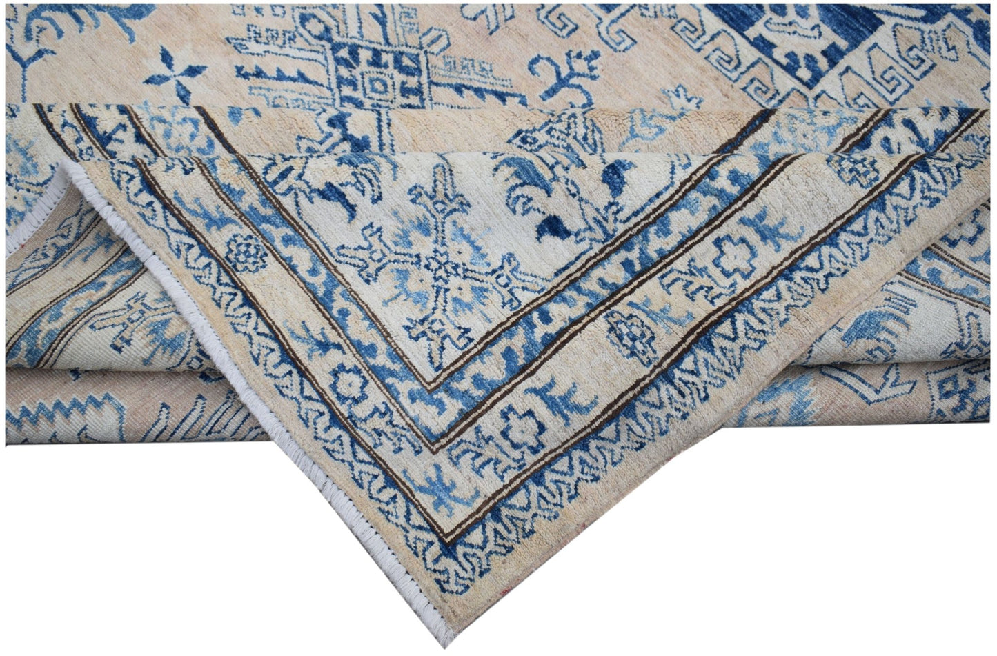A handmade Afghan Super Kazakh rug featuring traditional blue geometric motifs on a beige background.