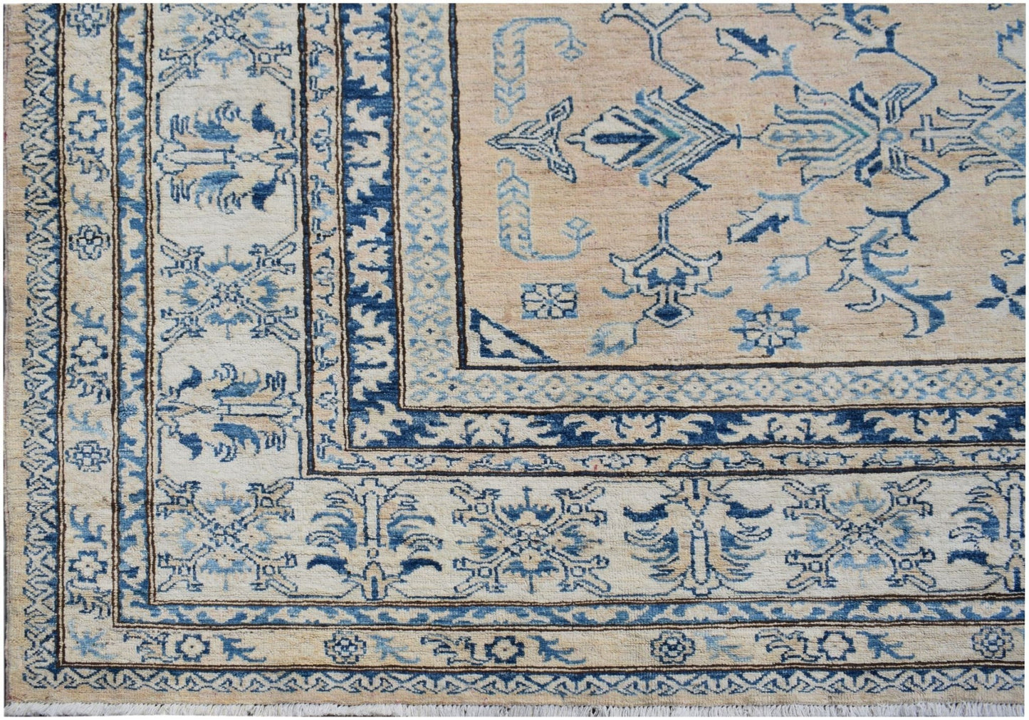 Handmade Afghan Super Kazakh rug featuring traditional blue geometric motifs on a beige field.