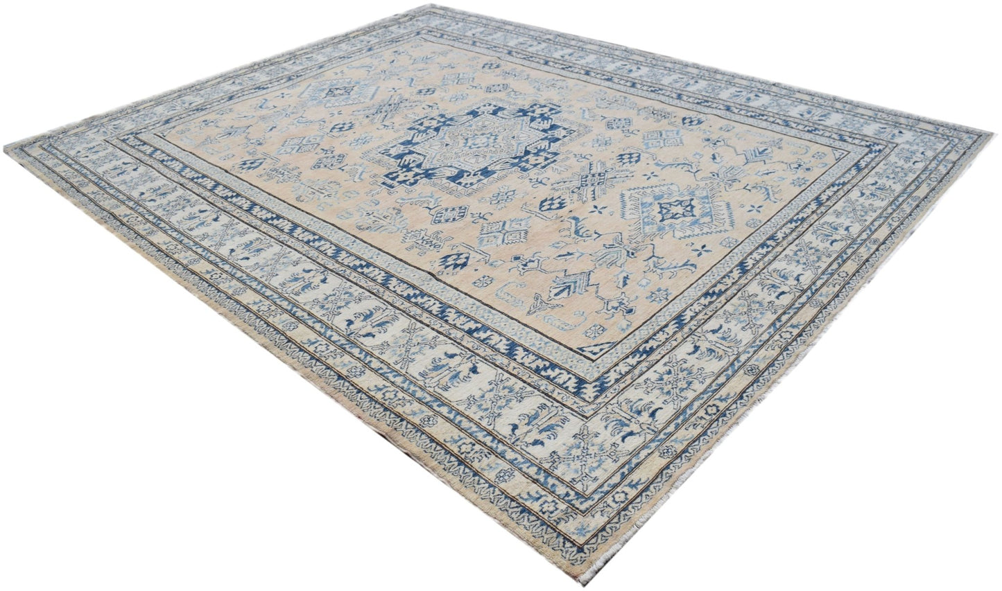 A handmade Afghan Super Kazakh rug featuring traditional blue geometric motifs on a beige field.
