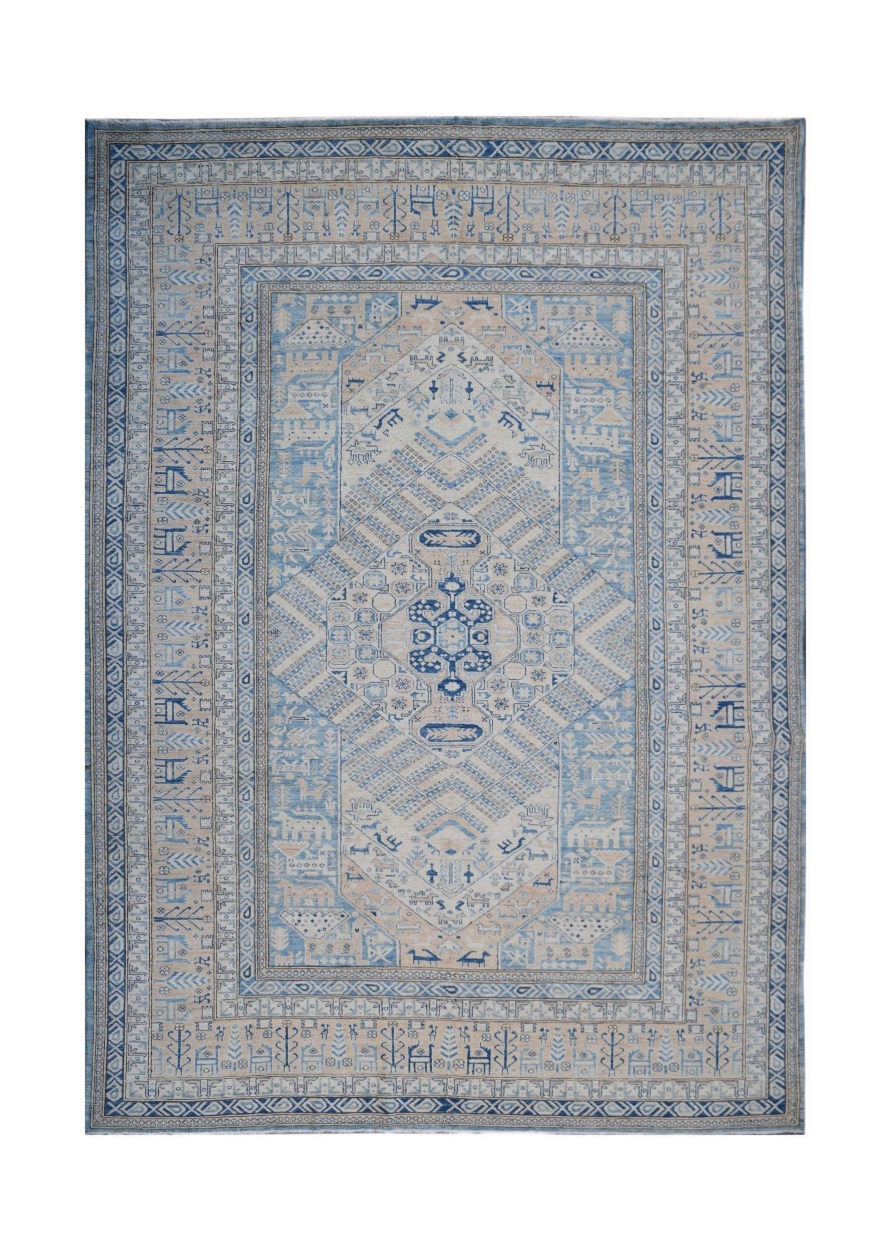 Handmade Afghan Super Kazakh rug featuring a blue and cream geometric medallion pattern.