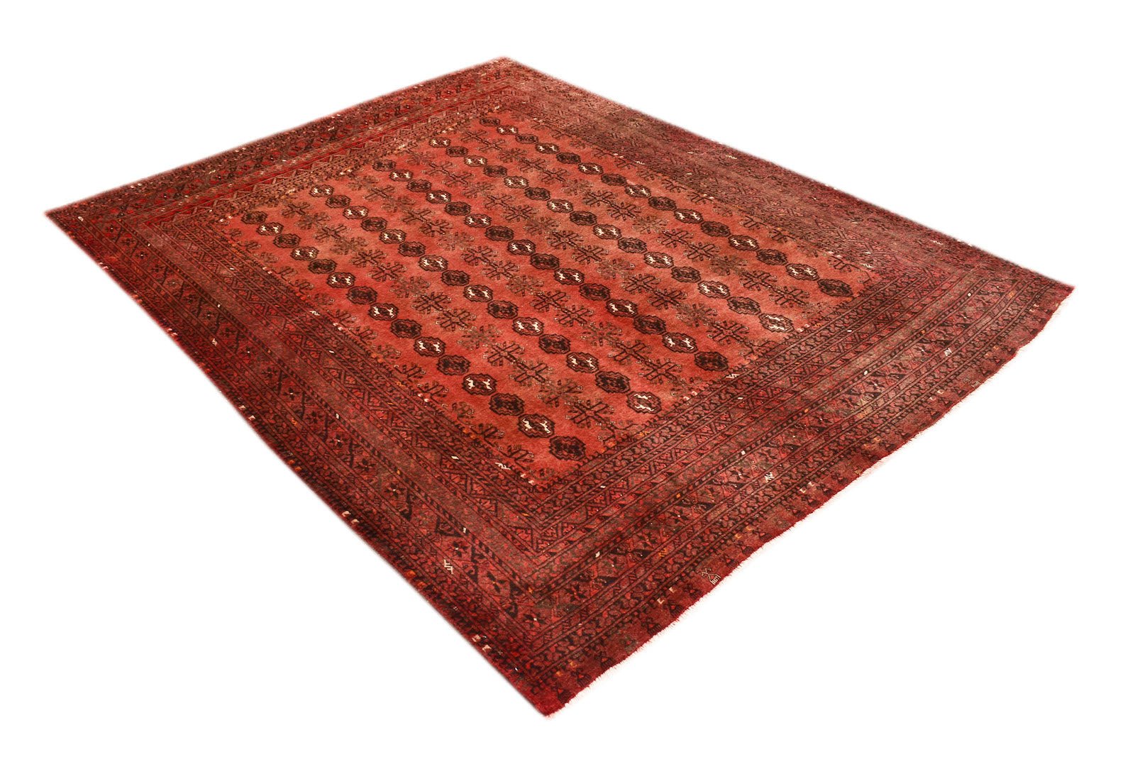 Vintage Afghan Turkmen rug with a red background and geometric patterns.