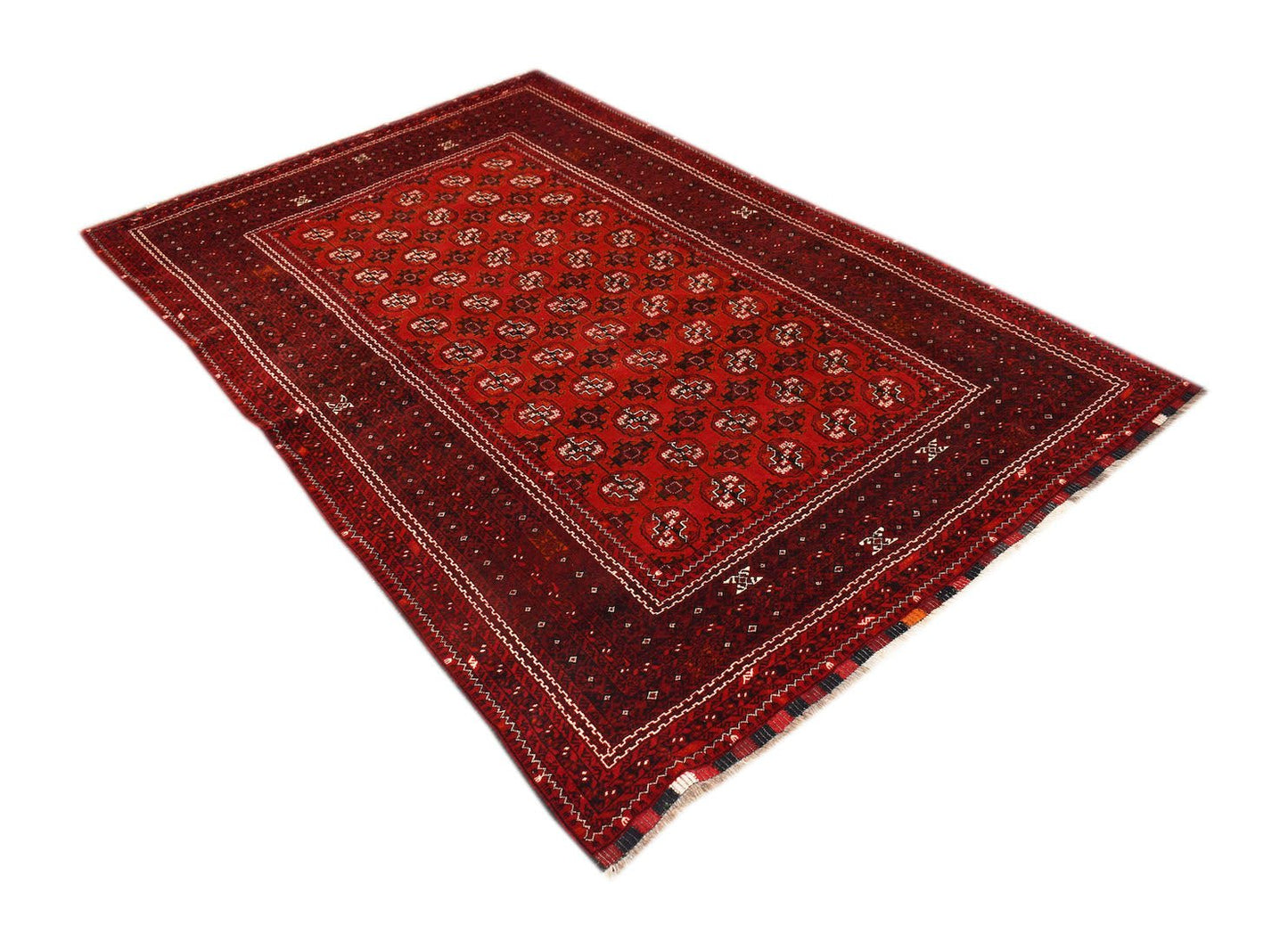 Vintage Afghan Turkmen rug with red and dark red geometric patterns.