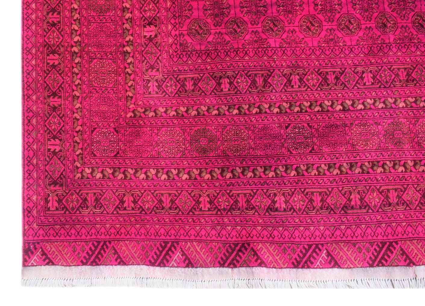 A vintage Afghan Turkmen rug featuring a vibrant magenta field with traditional geometric motifs.
