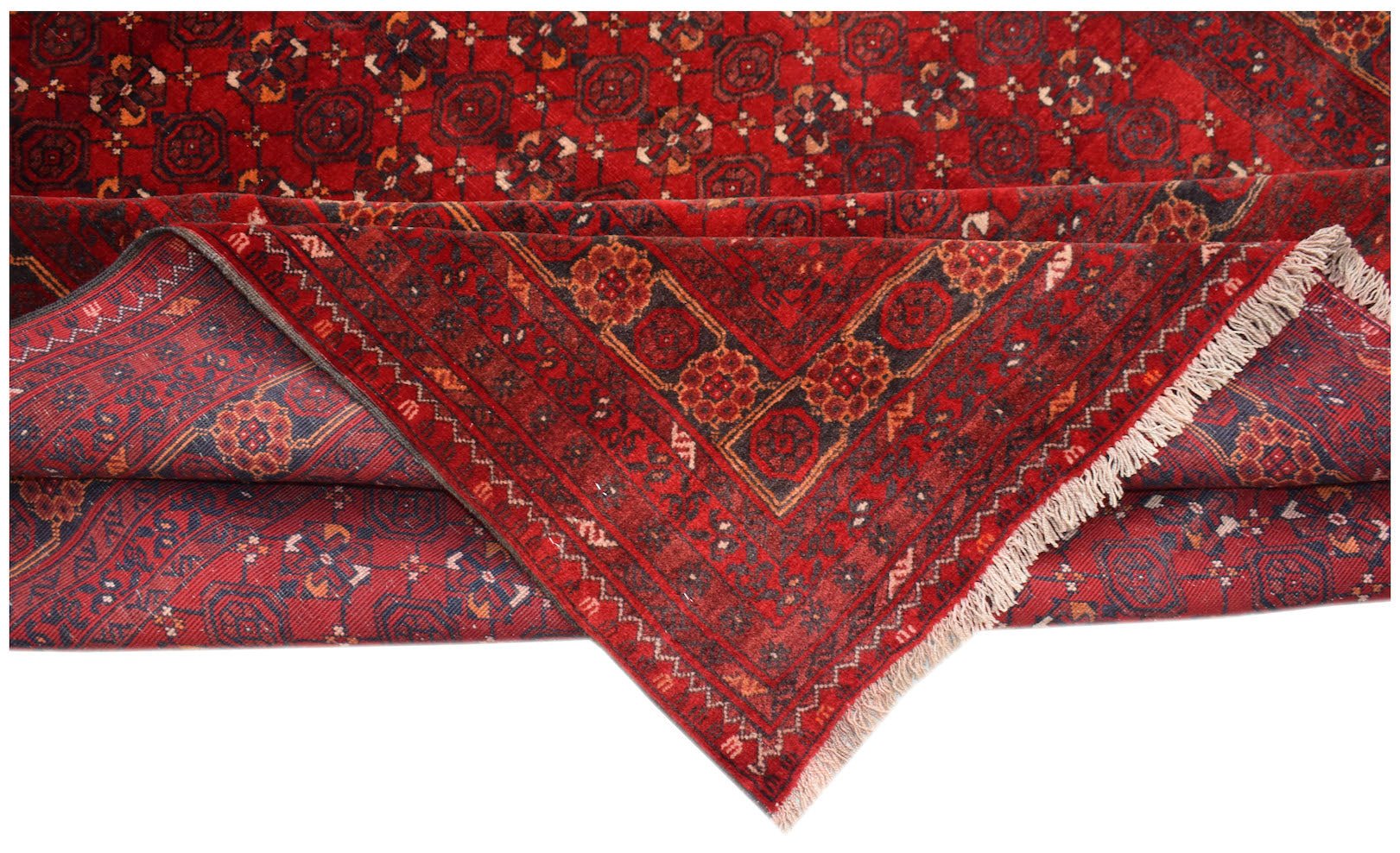 Vintage Afghan Turkmen rug with red and blue geometric patterns.