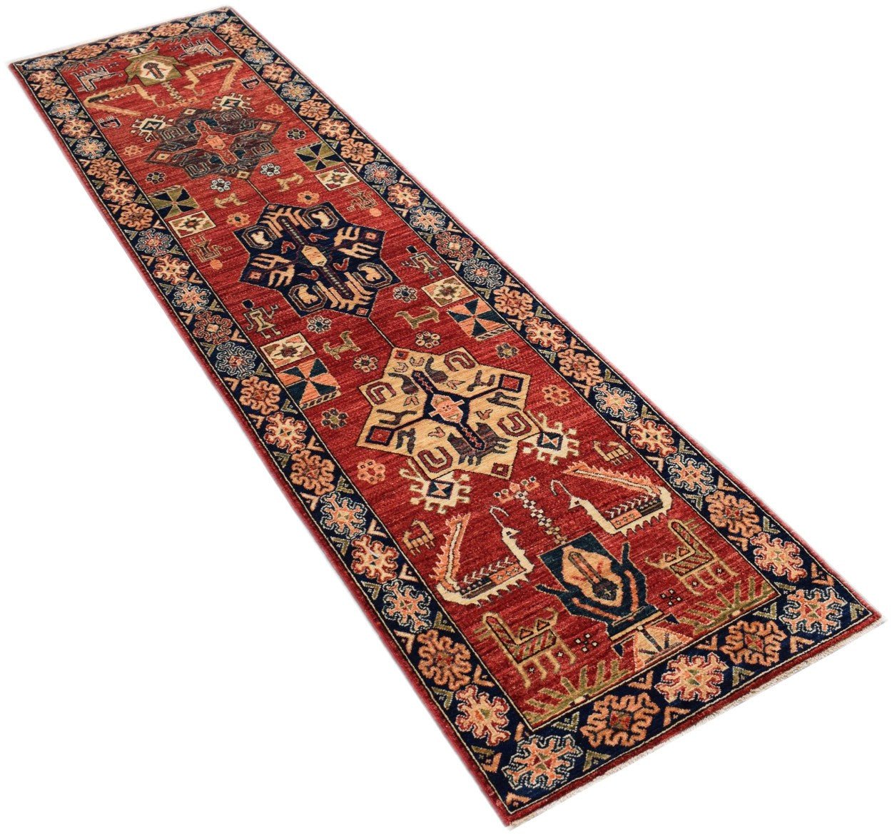 Handmade Afghan Chobi runner rug featuring traditional geometric patterns in red and blue tones.