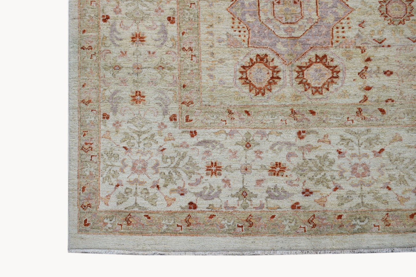 A handmade Afghan Chobi rug featuring a traditional Mamluk pattern in soft, earthy tones.
