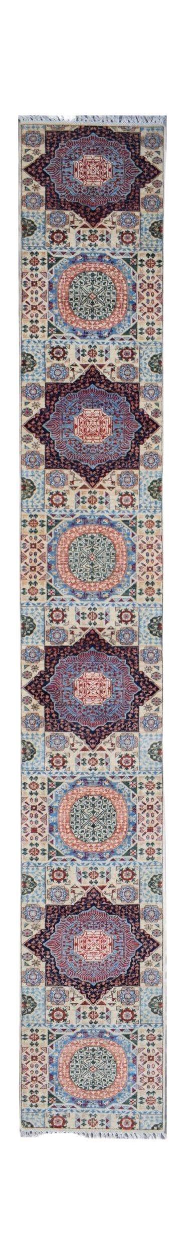A handmade Afghan Chobi runner rug featuring repeating geometric medallions in blue and red tones.
