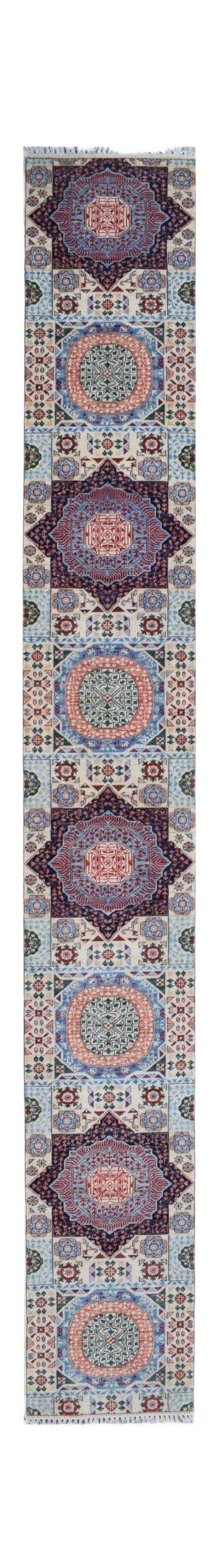 A handmade Afghan Chobi runner rug featuring repeating geometric medallions in blue and red tones.