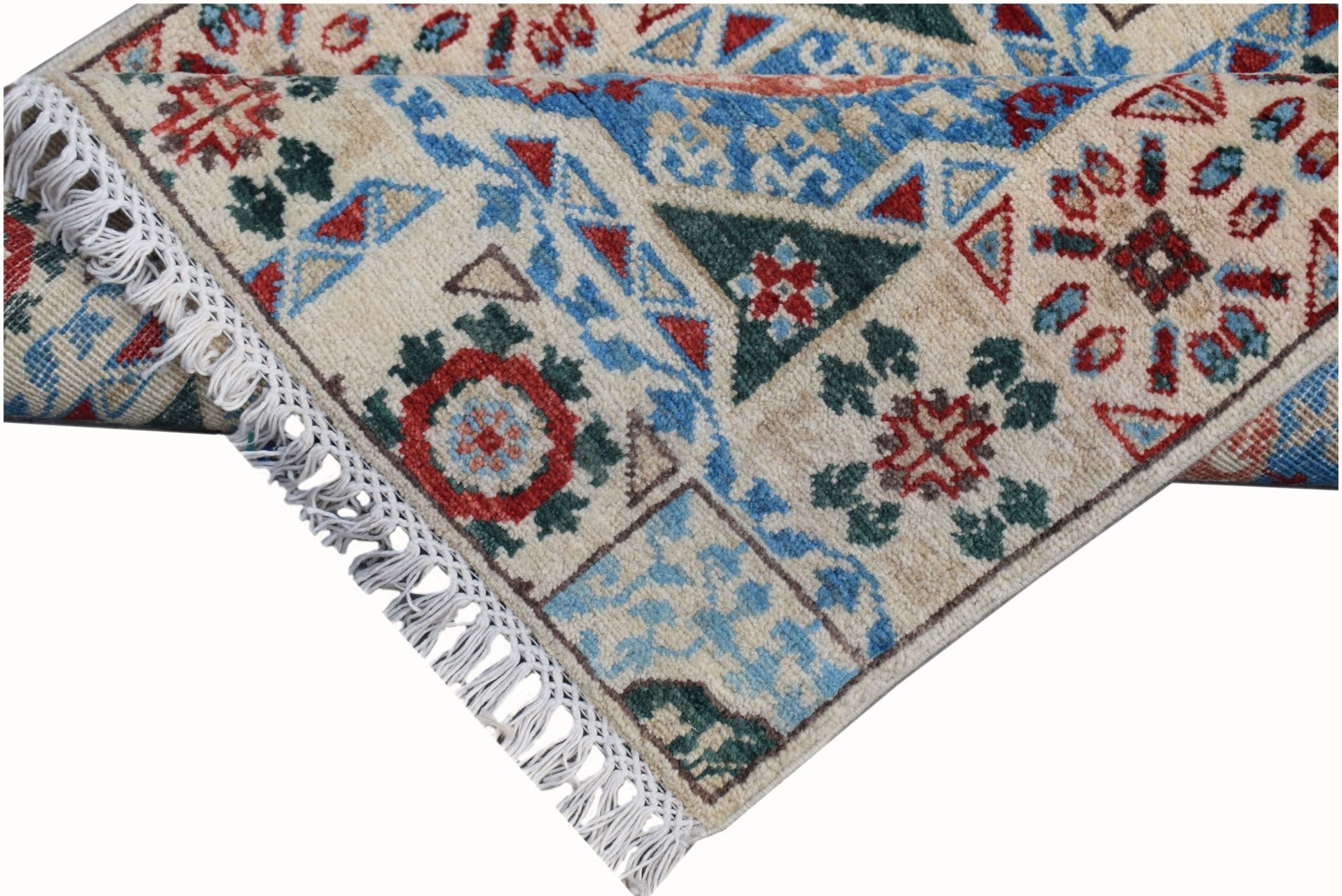 A handmade Afghan Chobi runner featuring a geometric Mamluk pattern in blue, red, and green.