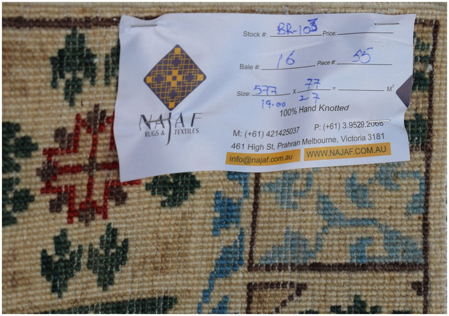 A hand-knotted Afghan Chobi runner featuring a traditional Mamluk medallion pattern.