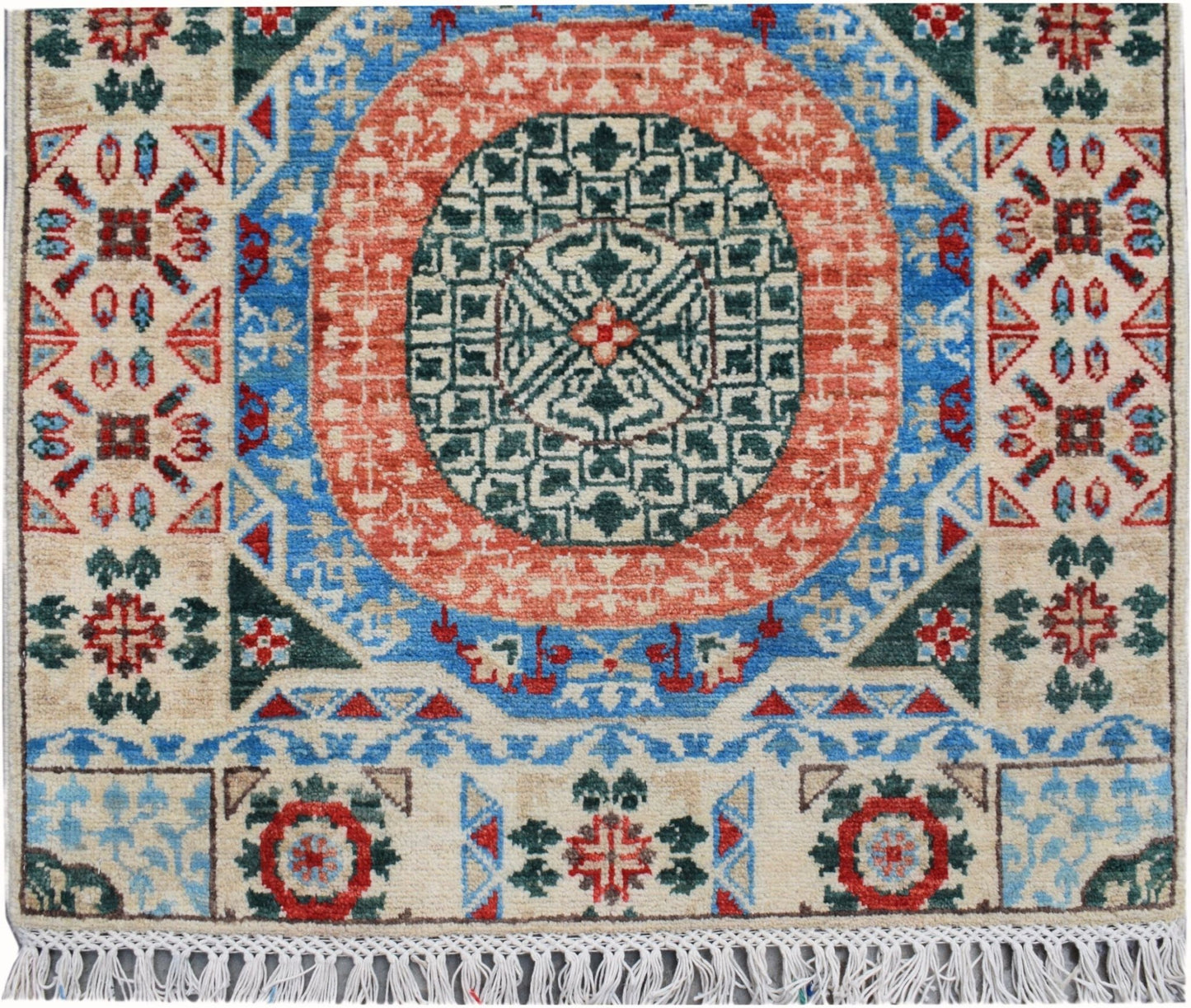 Handmade Afghan Chobi runner featuring a central geometric medallion in red, blue, and green.