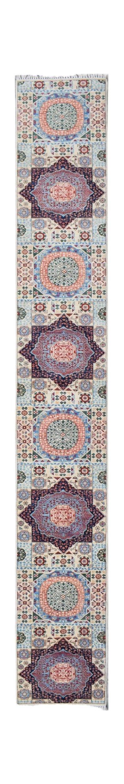 A handmade Afghan Chobi runner rug featuring alternating geometric medallions in blue and red.